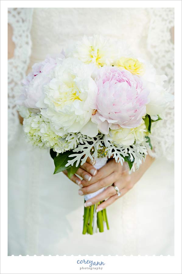 bridal bouquet of white and pink peonies