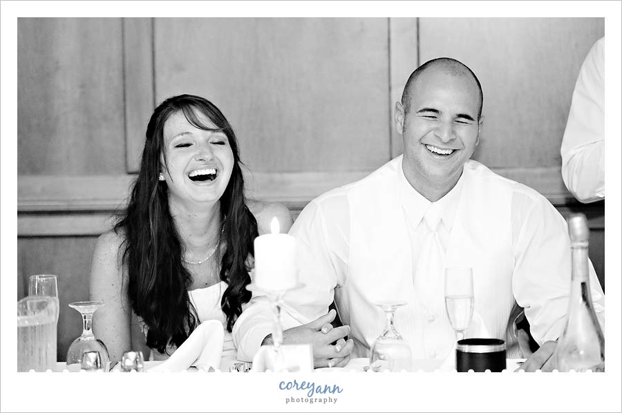 bride and groom laughing during toast in dover ohio