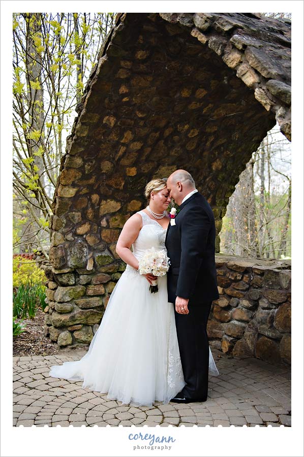 bride and groom outdoors at Landoll's Mohican Castle in loudonville ohio