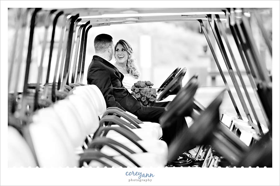 bride and groom in golf carts