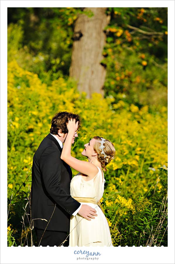 bride and groom in a field of goldenrod