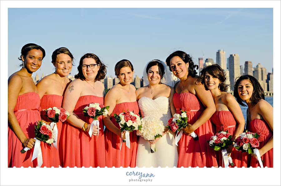 bridesmaids in hot pink dresses with pink and white bouquets