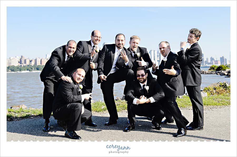 boyband pose with groomsman in New Jersey