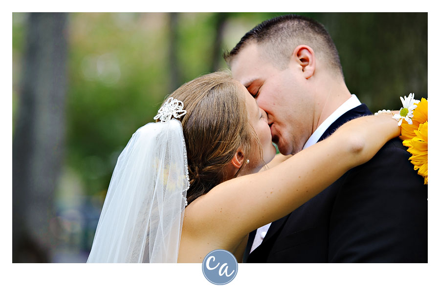 bride and groom kissing outside in mogadore ohio
