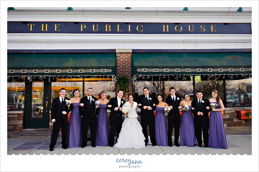 bridal party posing outside of the public house in cleveland ohio