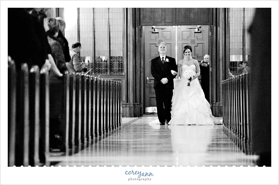 bride and father walking down aisle at St. Ignatius of Antioch
