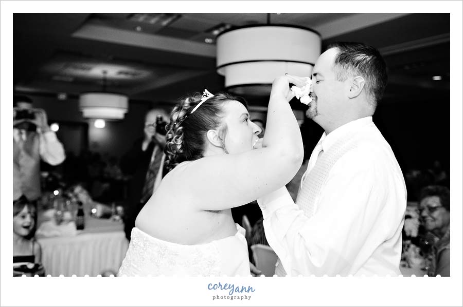 bride and groom cut the cake at hilton garden inn in windsor connecticut