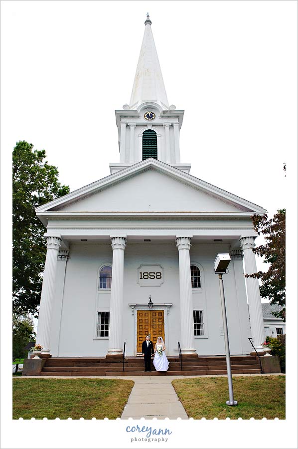 bride and groom in front of church in bloomfield ct
